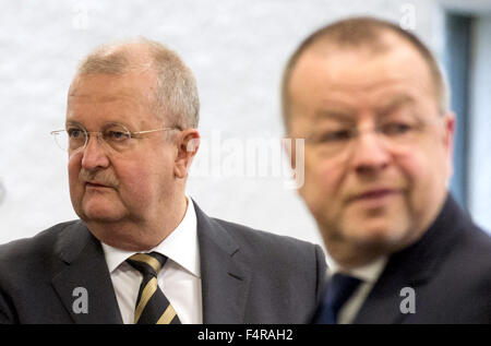 Stuttgart, Germany. 22nd Oct, 2015. Former CEO of Porsche Automobil Holding SE, Wendelin Wiedeking (L), and former CFO, Holger Haerter, stand prior to the start of trial in the regional court in Stuttgart, Germany, 22 October 2015. The former head of Porsche is being accused in connection with the planned but unsuccessful takeover of VW market manipulation. Photo: MARIJAN MURAT/dpa/Alamy Live News Stock Photo