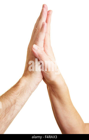 Two hands giving each other a High Five Stock Photo