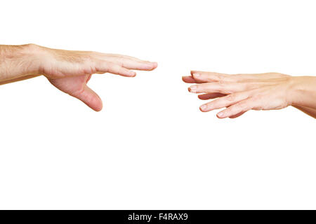 Two hands reaching for two other hands Stock Photo