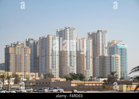 View of modern high-rise residential apartment blocks in Ajman Emirate in United Arab Emirates Stock Photo