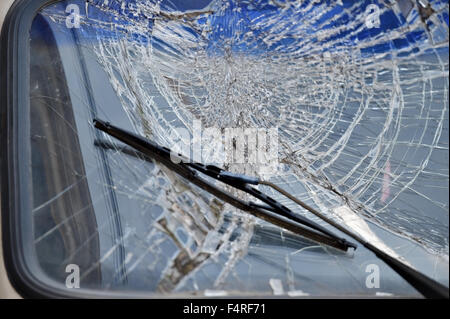 Detail shot with a broken car windshield after accident Stock Photo