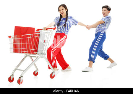 Young men and women shopping Stock Photo