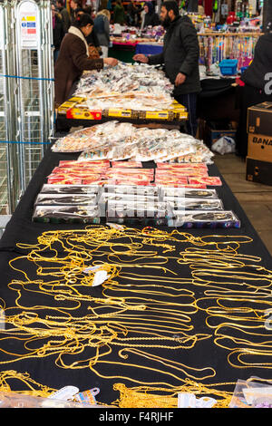 Asian jewellery on sale on a market stall, Leicester Market, Leicester, England, UK Stock Photo