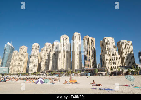 View of skyline of modern skyscrapers and beach at JBR area of Marina district of Dubai United Arab Emirates Stock Photo