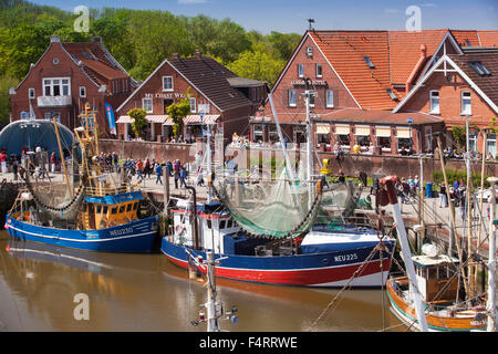 Crab cutters in the harbour of  Neuharlingersiel, East Friesland, Lower Saxony, Germany, Europe Stock Photo