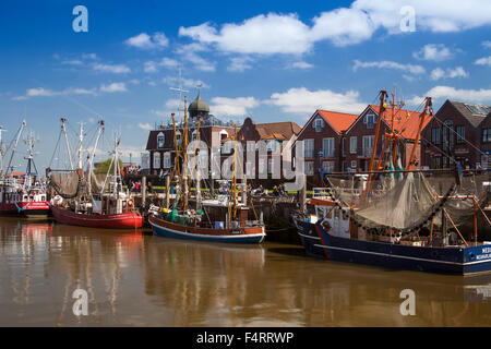 Crab cutters in the harbour of  Neuharlingersiel, East Friesland, Lower Saxony, Germany, Europe Stock Photo