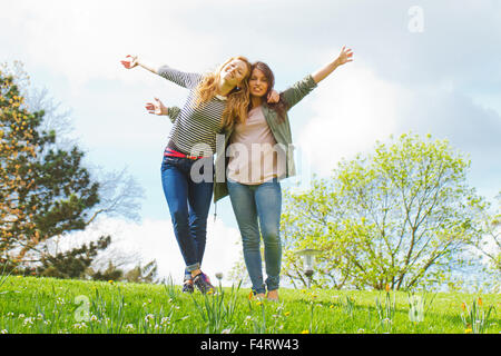 Two, happy girls enjoy the day Stock Photo