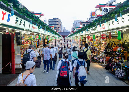 View along busy Nakamise Shopping Street at Sensoji Shrine in Asakusa district of Tokyo Japan Stock Photo