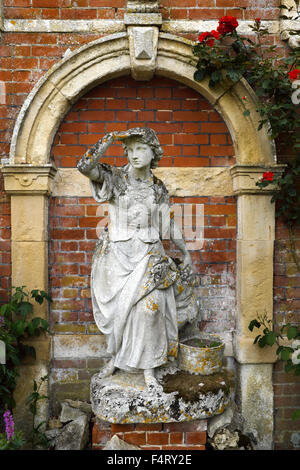 Ornamental sculture in the gardens of Somerleyton Hall, Somerleyton, Suffolk, England, UK Stock Photo