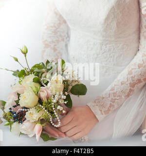 Bride with bouquet of flowers Stock Photo