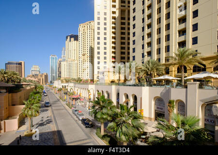 View along The Walk shopping and eating street at Jumeirah Beach Residences (JBR) in marina district of Dubai United Arab Emirat Stock Photo