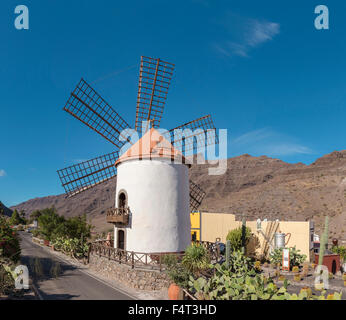 Spain, Europe, Mogan, Gran Canaria, Canary Islands, El Molino de Viento, windmill, city, village, summer, mountains, hills, Stock Photo