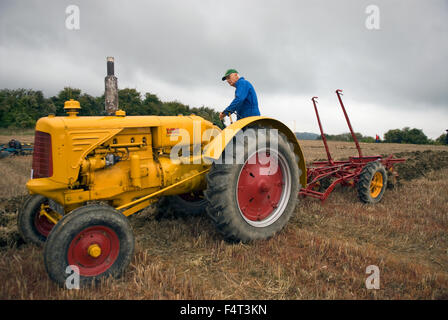 Farmer competing in the North East Hants Agricultural Association Ploughing Match 2015, Selborne, Alton, Hampshire, UK. Stock Photo