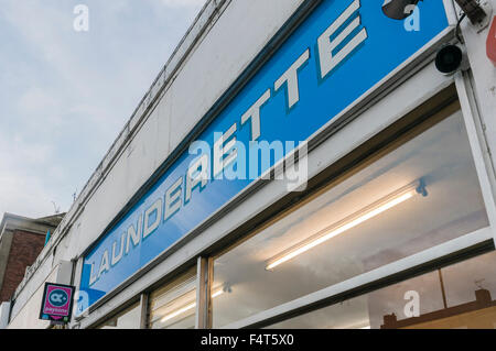 Sign for a launderette in London. Stock Photo