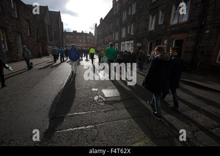 Home supporters making their way from Easter Road stadium at the conclusion of the Scottish Championship match between Hibernian and visitors Alloa Athletic. The home team won the game by 3-0, watched by a crowd of 7,774. It was the Edinburgh club's second season in the second tier of Scottish football following their relegation from the Premiership in 2013-14.