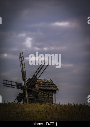 Oct. 14, 2015 - Windmill on the background of a stormy sky (Credit Image: © Igor Goiovniov via ZUMA Wire) Stock Photo