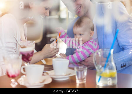 Young family in cafe Stock Photo