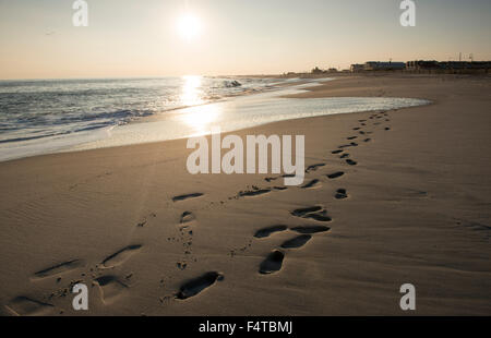 Footprints in the sand on Cape May Beach, New Jersey USA Stock Photo
