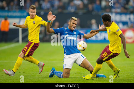 Gelsenkirchen, Germany. 22nd Oct, 2015. Schalke's Eric Maxim Choupo-Moting (C) in action against Prague's Marco Paixao (R) and Lukas Marecek during the UEFA Europa League Group K soccer match between FC Schalke 04 and AC Sparta Prague at the Veltins Arena in Gelsenkirchen, Germany, 22 October 2015. Photo: GUIDO KIRCHNER/dpa/Alamy Live News Stock Photo