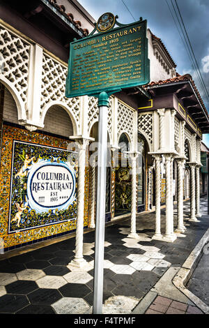 Legendary Columbia Restaurant's Spanish tile murals & ornate architecture with historical plaque, Ybor City.  FL, USA Stock Photo