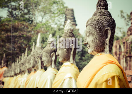 Aligned Buddha Statues at Wat Yai Chaimongkol Ayutthaya Bangkok Thailand Stock Photo