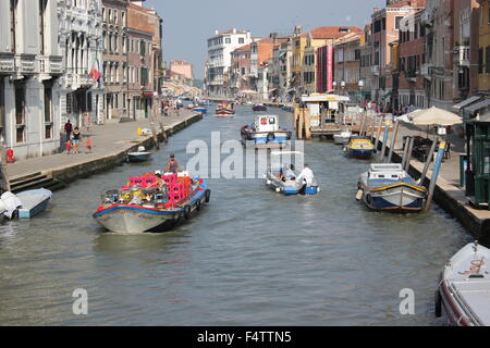 Boats speeding along the grand canal in Venice, Italy Stock Photo