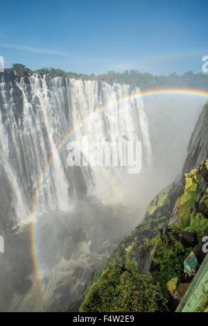 LIVINGSTONE, ZAMBIA - Victoria Falls Waterfall with rainbow Stock Photo