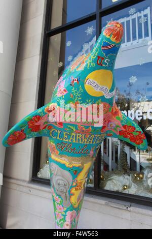 Clearwater, Florida, USA. 23rd Dec, 2013. A colorful painted dolphin statue in downtown Clearwater. The beautiful resort of Clearwater has millions of tourists every year - but few ever visit the downtown area. © Ruaridh Stewart/ZUMA Wire/ZUMAPRESS.com/Alamy Live News Stock Photo