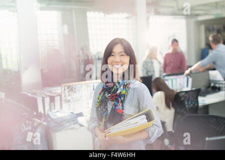 Portrait confident fashion designer in office Stock Photo