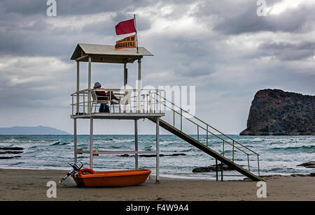 Life Guard on a rainy day in Crete. Stock Photo