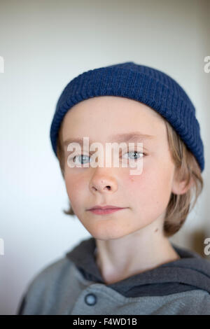 Sweden, Vastergotland, Lerum, Portrait of boy (10-11) wearing blue knit hat