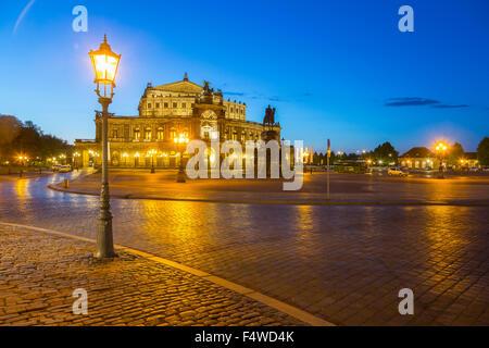 Theaterplatz, theatre square, with Semperoper opera house and equestrian monument at dusk, Dresden, Saxony, Germany Stock Photo