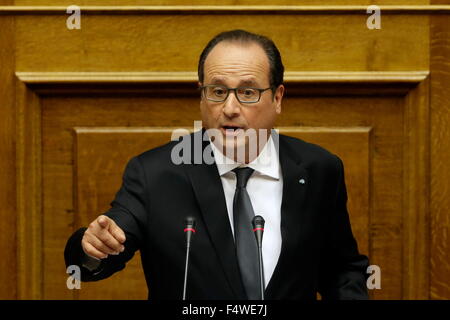 Athens, Greece. 23rd Oct, 2015. French President Francois Hollande delivers a speech to the lawmakers at the Greek parliament in Athens, Greece, Oct. 23, 2015. French President Francois Hollande started the second and final day of his official visit here on Friday by reaffirming France's strong support to Greece's reform drive to overcome the debt crisis and reiterating the need for start of dialogue on debt relief once the Greeks meet bailout commitments. Credit:  Pool/Thanassis Stavrakis/Xinhua/Alamy Live News
