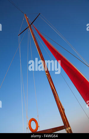 Image of a yacht mast and rigging during sailing in the sea. Stock Photo