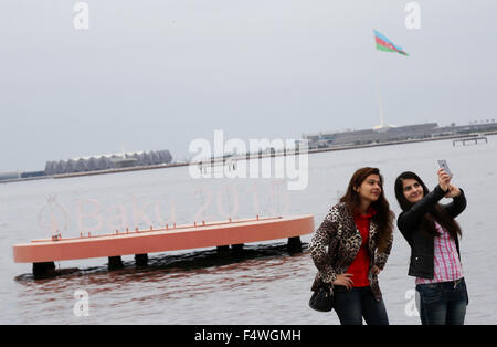 Baku, Azerbaijan. 22nd Oct, 2015. Two girls are taking a selfie at the coastline of the Caspian Sea in Baku, Azerbaijan, 22 October 2015. Photo: Friso Gentsch/dpa/Alamy Live News Stock Photo