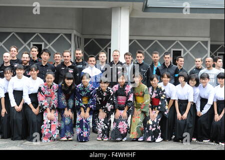 Students from Urawa Municipal High School display a homemade sign