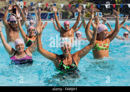 Aquarobics in a swimming pool. Stock Photo