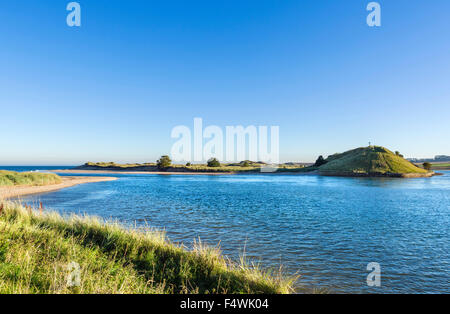 Mouth of the River Aln looking towards Church Hill and St Cuthbert's Cross, Alnmouth, Northumberland, England, UK Stock Photo