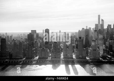 Aerial shot of Manhattan, captured from a helicopter flying over the Hudson River on the West Side, New York City USA Stock Photo