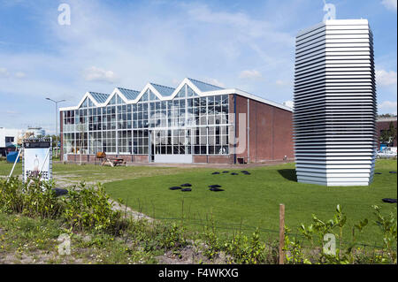 Sept. 10, 2015 - Rotterdam, The Netherlands, Holland - The international famous Dutch designer Daan Roosegaarde launched his Smog Free Project in Rotterdam, the Netherlands. The Smog Free Project creates clean urban skies and creates Smog Free Rings. .In some cities, this pollution is visible. In others, air pollutants and smog may be invisible, but the impact on our daily lives and health is very real. The Smog Free Tower produces smog-free bubbles of public space, allowing people to breathe and experience clean air for free. The first 7 meter high Smog Free Tower cleans 30.000m3 of air per h Stock Photo