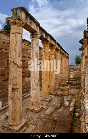 Remains of the latrines off Frontinus Street at the Roman settlement of Hierapolis above Pamukkale near Denizli, Turkey. Stock Photo