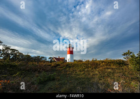 Nauset Light, a landmark red and white lighthouse at Nauset Light Beach in Eastham MA on Cape Cod Massachusetts USA. Wide angle Stock Photo