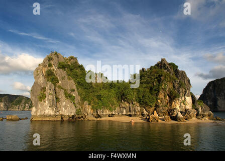 Secluded beach in isolated island in Ha Long Bay, Vietnam. Quiet tropical beach, Cat Ba National Park, Ha long,Halong Bay, Vietnam Stock Photo