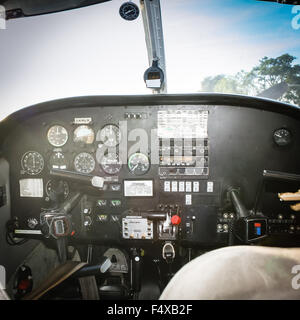 inside a flight deck. Cockpit view from  the back seat of a small aircraft Stock Photo