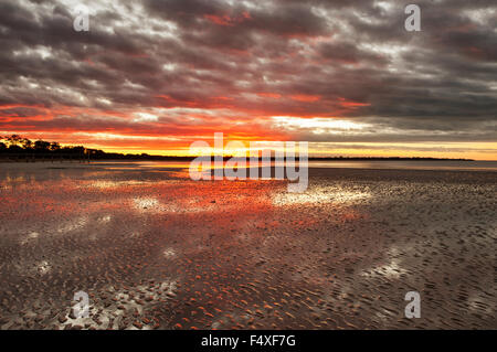 Colourful sunset at Hervey Bay. Stock Photo