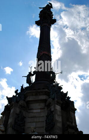 Christopher Colombus Column in silhouette against cloudy blue sky, Barcelona, Spain Stock Photo