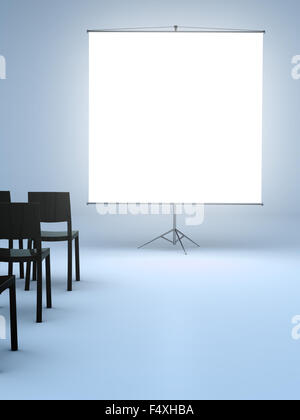 Large plain white projector screen in an empty room with chairs for an audience. Stock Photo