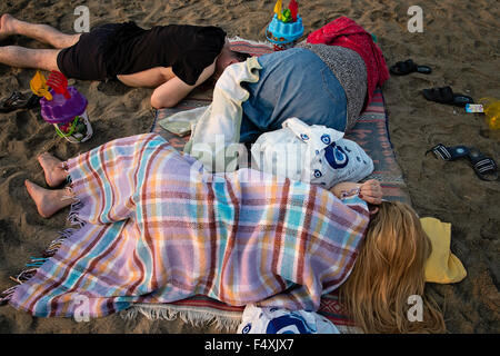 People sleep on the beach at the holiday town of Amasra in the Province of Bartin, Turkey Stock Photo