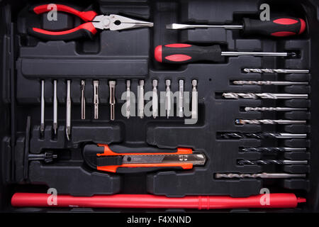 Different kind of countersinks and instruments in black toolbox Stock Photo