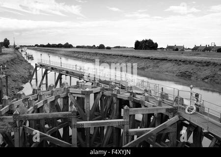 Approach on River Nene at low tide to Crosskeys Bridge at Sutton Bridge, Lincolnshire. Stock Photo